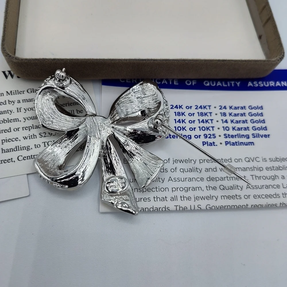 Vintage NIB Nolan Miller Silver-tone Bow Brooch With Rhinestones